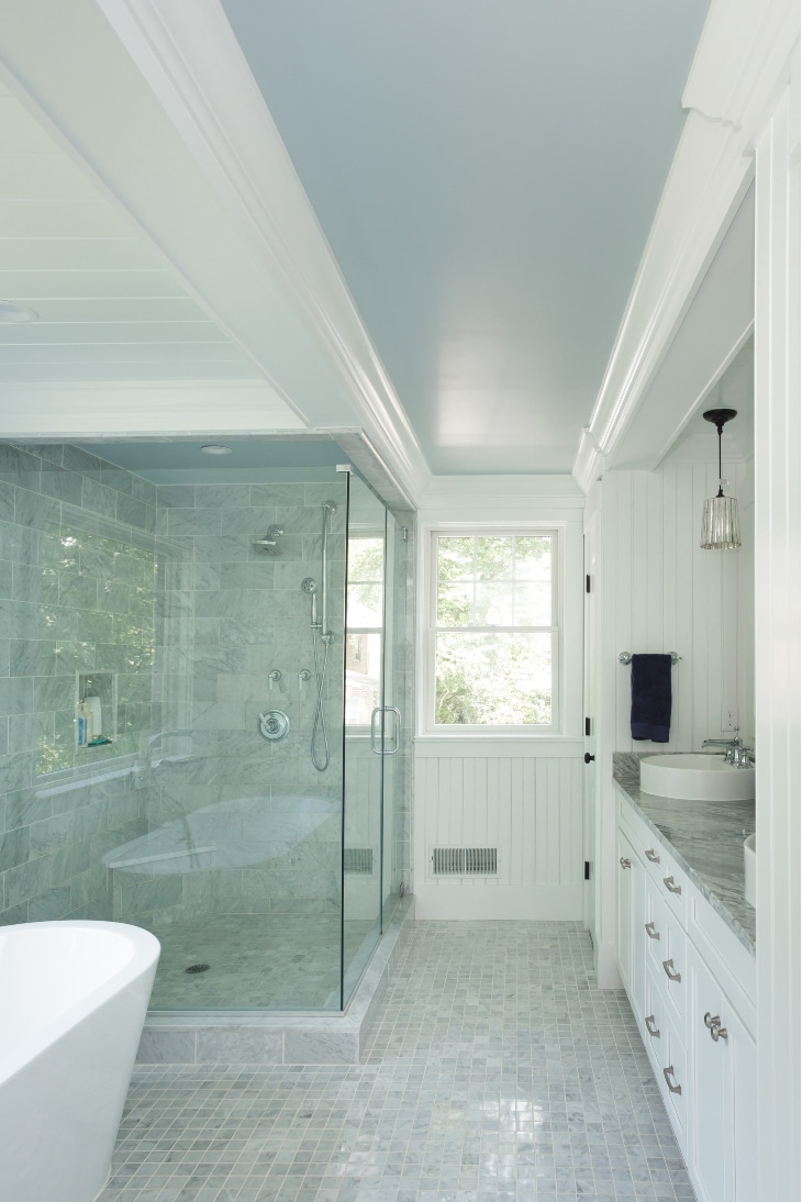A Custom Bathroom Remodel With A Wide Mirror, New Lights, And Two Sinks In Radnor Pa